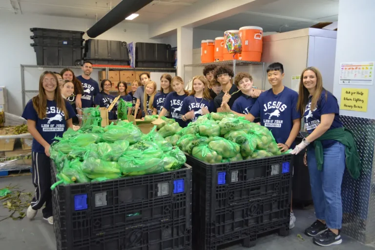 Student group packing produce bags