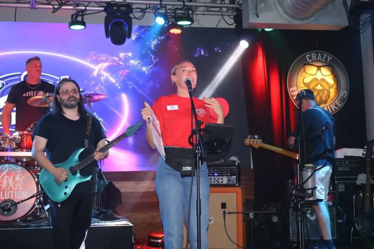A vocalist performing with the band